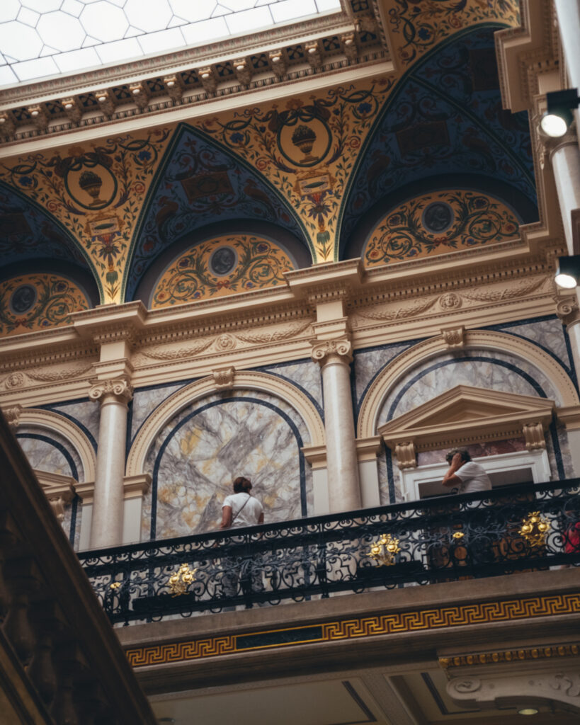 Architectural photography by Łukasz Zając, ornate historical interior with decorative golden ceilings and balconies, Poland